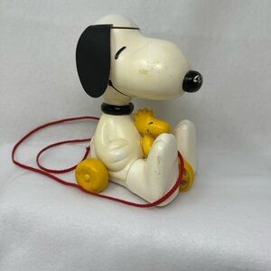 Peanuts Snoopy Pull Toy with Yellow Wheels and Red String